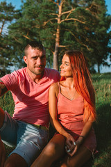 Smiling couple in love, outdoors, having joyful moment together