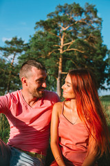 Smiling couple in love, outdoors, having joyful moment together