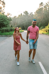 Smiling couple in love, outdoors, having joyful moment together