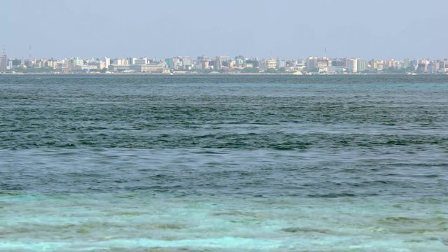 View of Male City from Vadhoo Island, Maldives