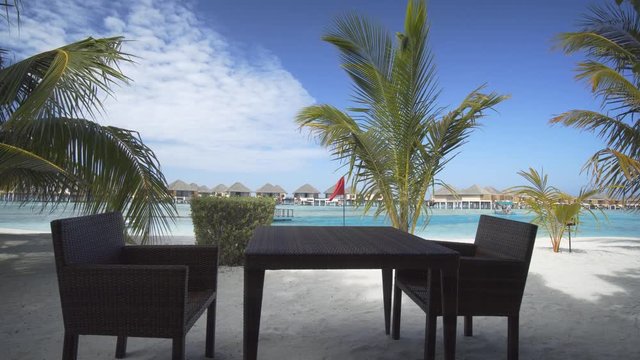 Table and Chairs for Seaside Dining at a Maldives Resort