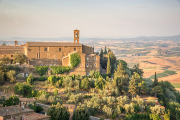 Fototapeta na wymiar View of Montalcino, countryside landscape in the background, Tuscany, Italy