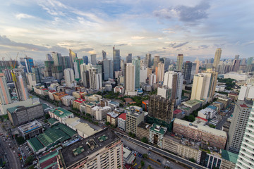 Fototapeta na wymiar Makati Skyline at sunset. Makati is a city in the Philippines