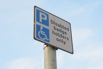 Disabled badge holders only - parking sign