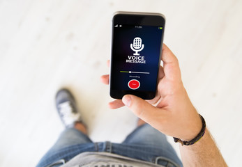 male hand voice message smart phone - obrazy, fototapety, plakaty