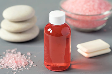 Products for body care, shower gel, shampoo, bath salts. Pink color