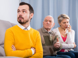 Grandfather instructs grandson