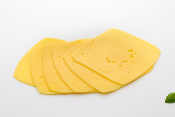 Cheese slices on the white background.