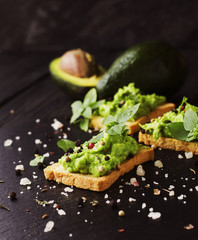toast with a paste of avocado and pesto basil, spices