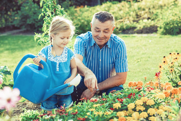 Watering flowers in the garden