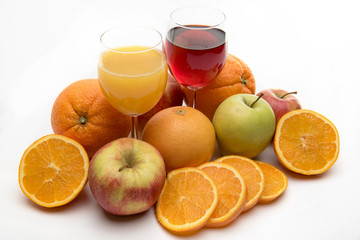 fresh orange, apple and grapefruit juice and fruits