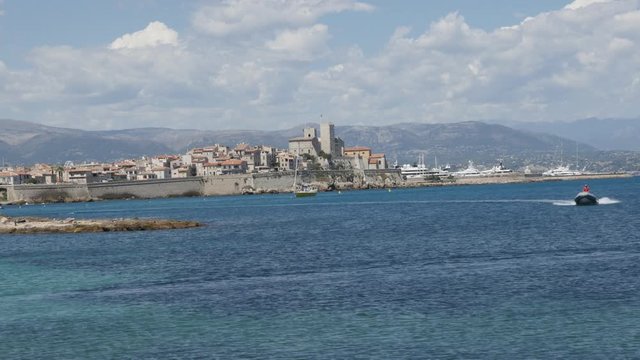 Fortified city on French riviera with blue sea background 