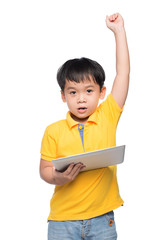 Portrait of cheerful boy with backpack holding digital tablet with hand raised