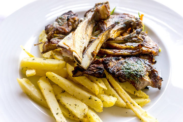 juice roasted lamb chops on the table