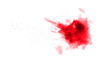 abstract red powder splatted on white background,Freeze motion of red powder exploded.