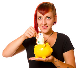 Junge Frau mit Sparschwein 
