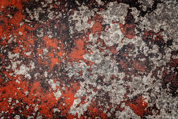 old red cracked paint on concrete background