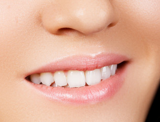 Naklejka premium Woman's smile. Healthy white woman's teeth. Dental hygiene, oral care concept. Teeth whitening. Stomatology concept