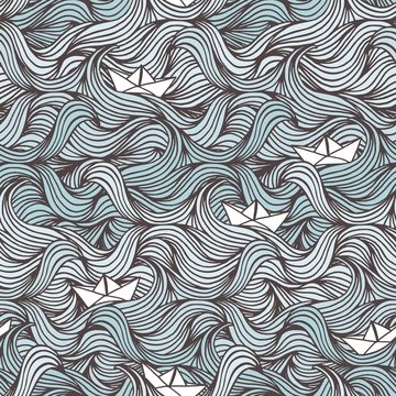Hand drawn seamless pattern with waves and cute little paper boats