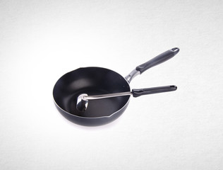 pan or metal frying pan on a background.