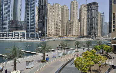Fototapeta na wymiar Tall buildings in Dubai, United Arab Emirates