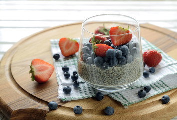 Chia seed pudding with fresh berries, healthy breakfast concept, selective focus