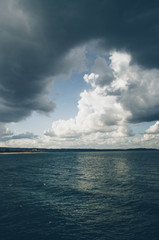 dramatic Baltic seascape with fluffy clouds