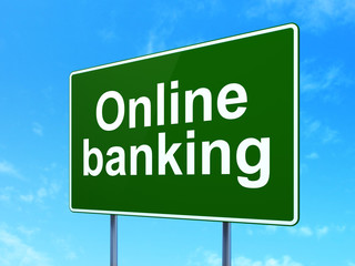 Currency concept: Online Banking on road sign background