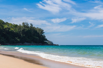 Fototapeta na wymiar Blue sky and calm sea on Naithon Noi beach in Phuket Thailand