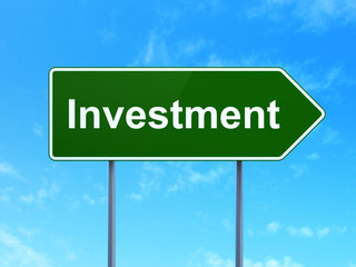 Finance concept: Investment on road sign background