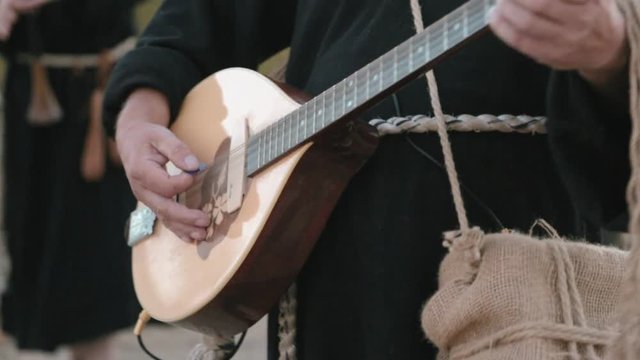 Perfomance medieval ensemble of monks Templars