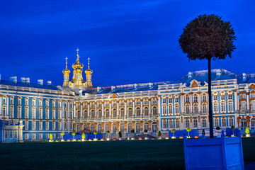 Late evening at Catherine Palace the summer residence of the Russian tsars at Pushkin, Saint-Petersburg. Square and trees