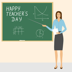 beautiful young woman teacher standing at the blackboard with a pointer. Happy teacher's day