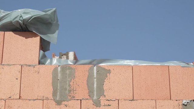 brickwork covered with foil 