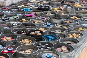 Fidget spinners at a flea market various models