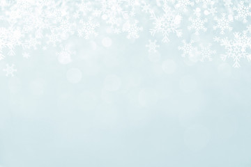 Blue Christmas background with snowflakes.