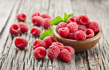 Raspberry on a wooden background