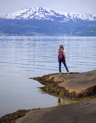 Fototapeta na wymiar girl hiker at the Hardangerfjorden