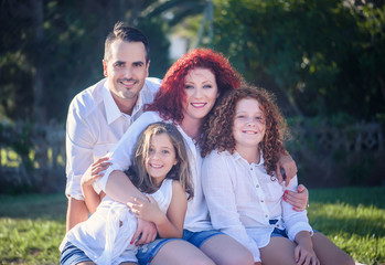 Fototapeta premium Happy family mum, rpapa and two daughters