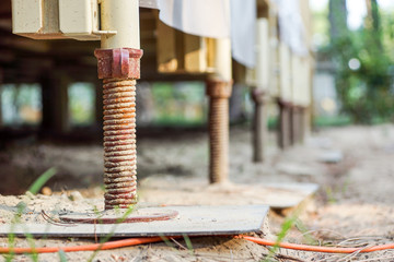 Adjustable metal foot