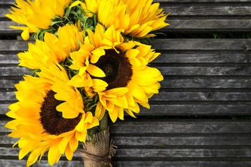 Yellow Sunflower Bouquet on Wooden Rustic Background