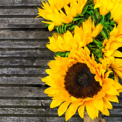 Yellow Sunflower Bouquet on Wooden Rustic Background