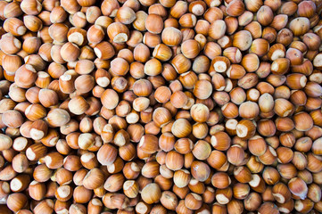 Hazelnuts forming a background