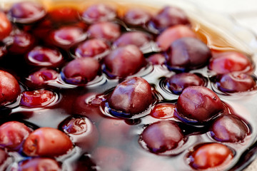 ripe cherries in the plate closeup
