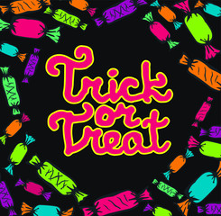 Vector background for Halloween party. The handwriting Trick or treat and scattered candy. Gloomy background for a banner or postcard