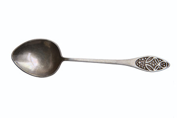 Vintage spoon isolated on white background. Little dessert spoon with ornament.