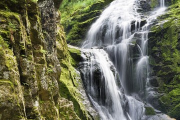 Fototapeta na wymiar Long time exposure of Kamienczyk waterfall in Karkonosze Mountains, Poland