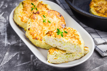 Vegetarian feta zucchini fritters. Selective focus, close up.