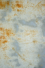 Old metal wall texture background with scratches and cracks.