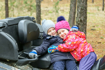 Two little caucasian kids  having fun together
